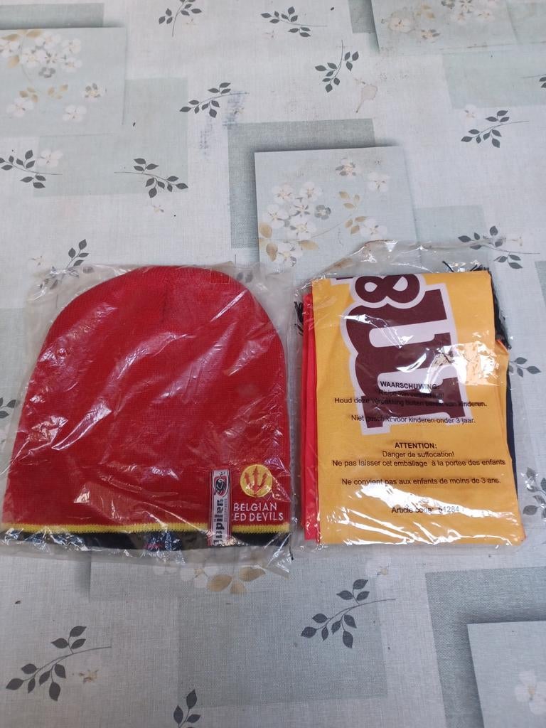 Must en sjaal van de rode duivels, Ophalen