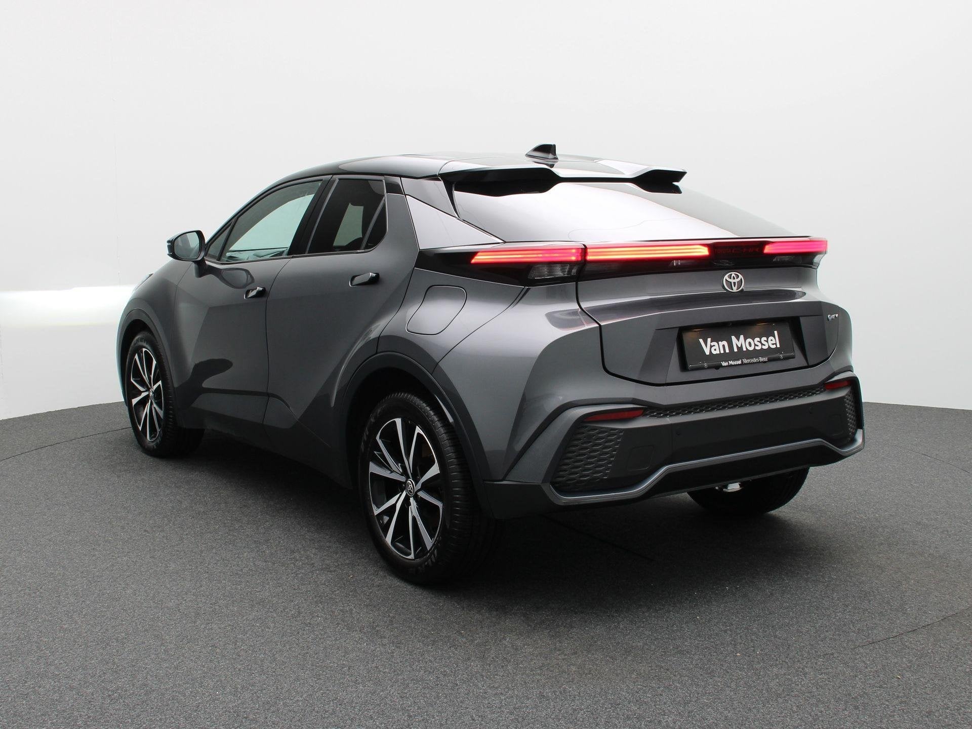 Toyota C-HR 1.8 Hybrid Prestige Bi-Tone E-CVT | 10J Garantie, Stof, Zwart, 4 cilinders, 109 g/km