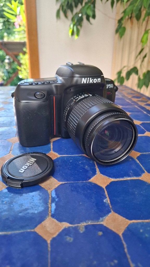 Nikon F50 + NIKKOR zoom + accessoires, Audio, Tv en Foto, Ophalen of Verzenden, Gebruikt, Spiegelreflex, Nikon
