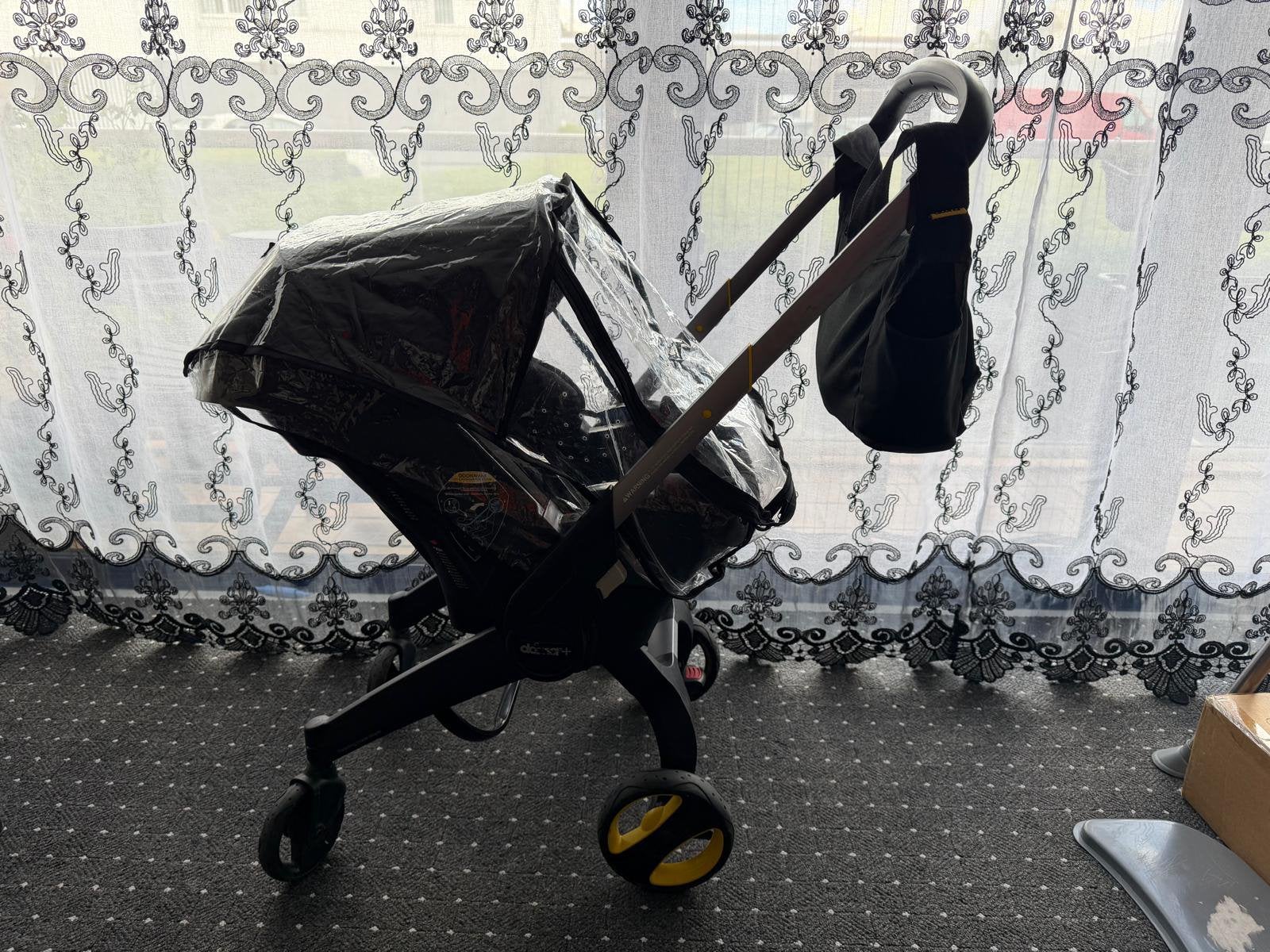 Buggy Doona + siège auto, Enlèvement, Comme neuf, Autres marques, Protection de pluie