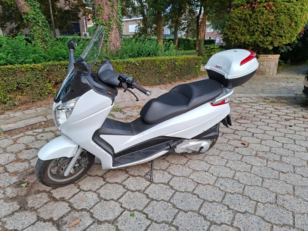 Scooter Honda FES 125A, Motos, Particulier, Scooter, Poignées chauffantes
