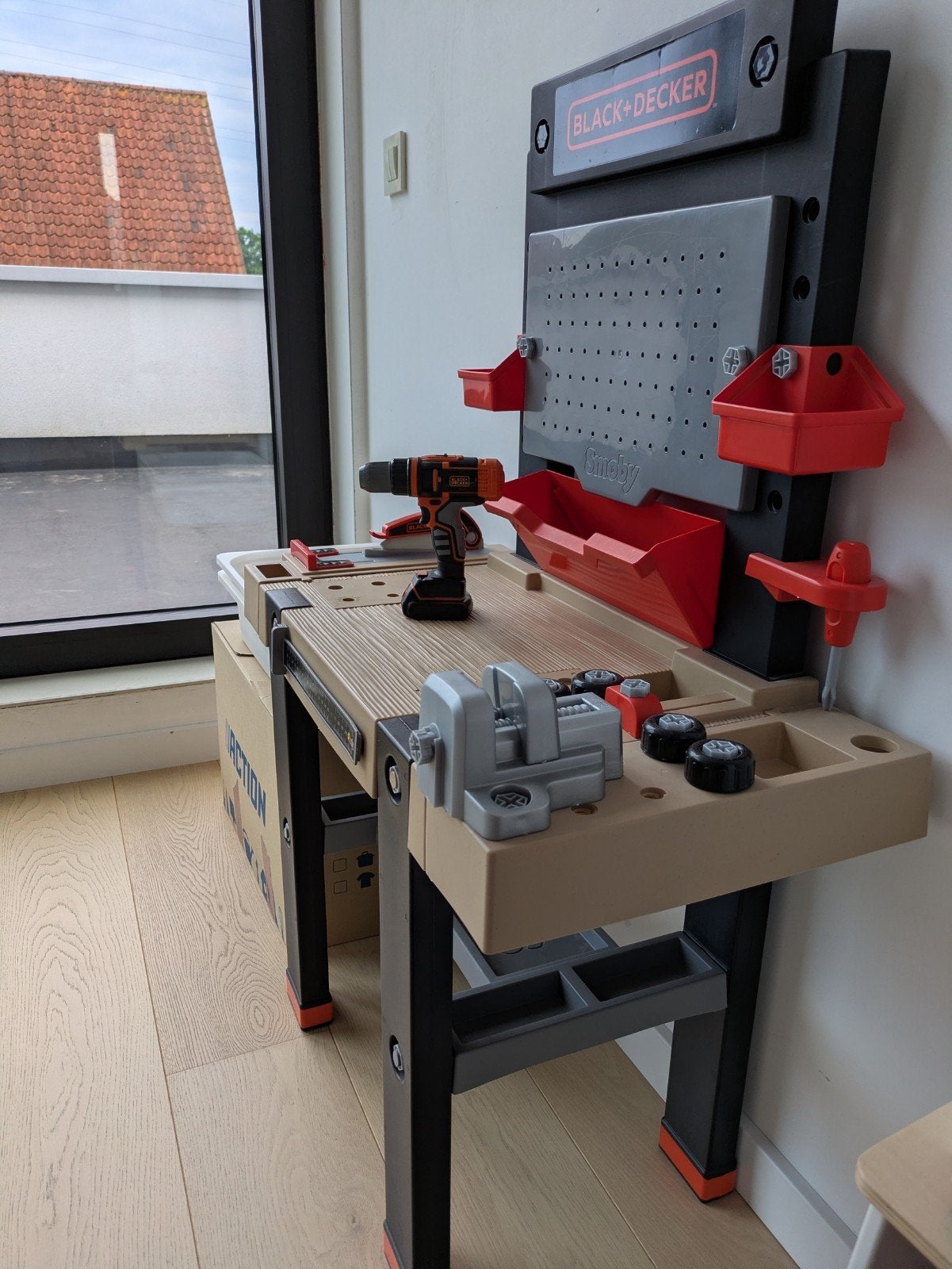 Werkbankje met toebehoren Smoby, Ophalen