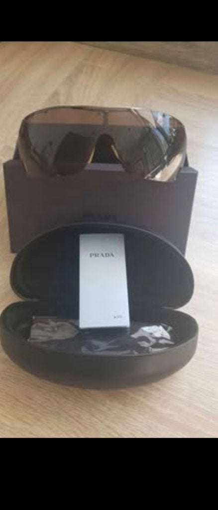 Prada zonnebrillen, Handtassen en Accessoires, Ophalen of Verzenden, Nieuw, Bruin, Zonnebril
