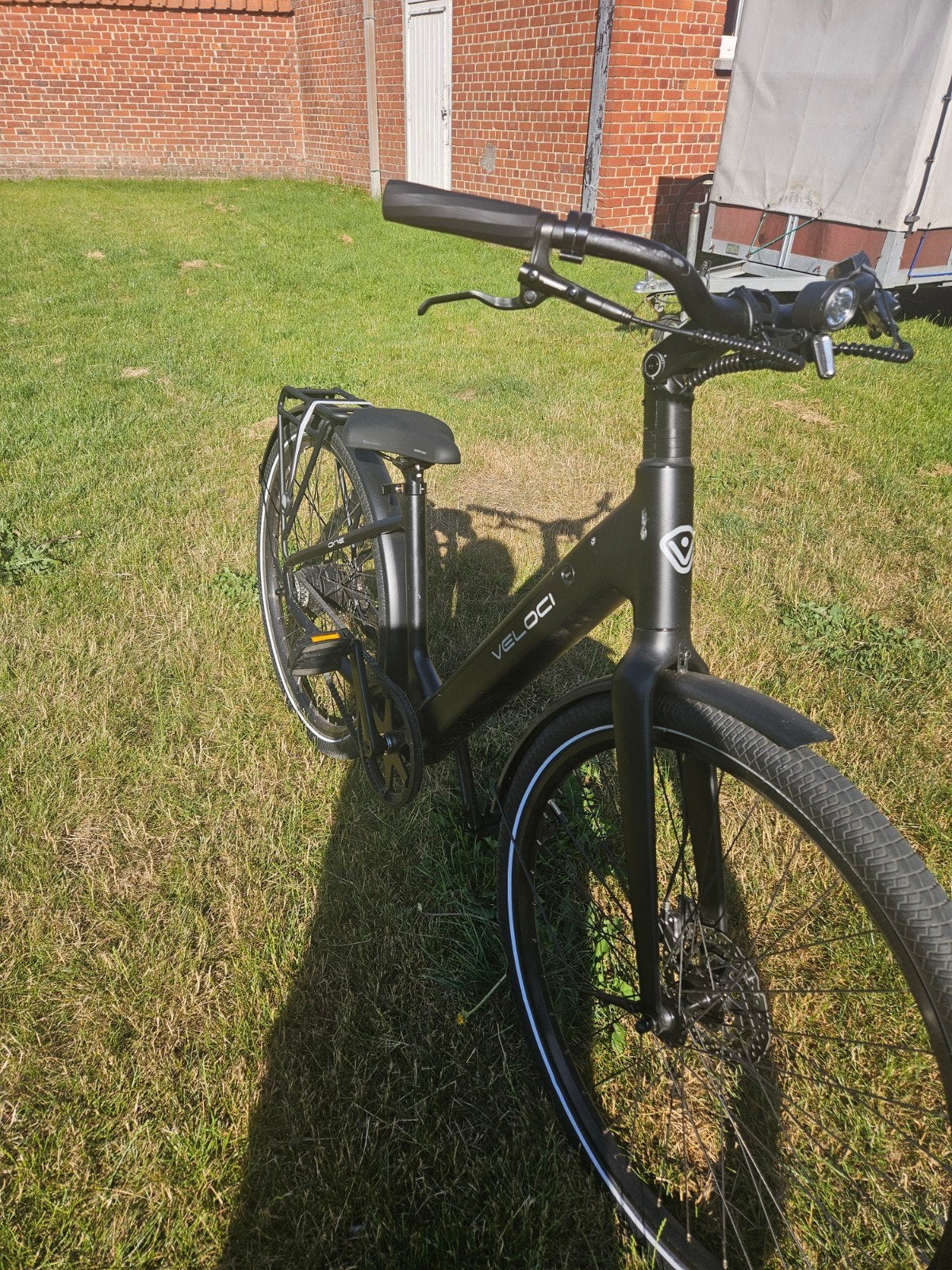 Veloci elektriche damensfiets met aandrijf riem, Ophalen
