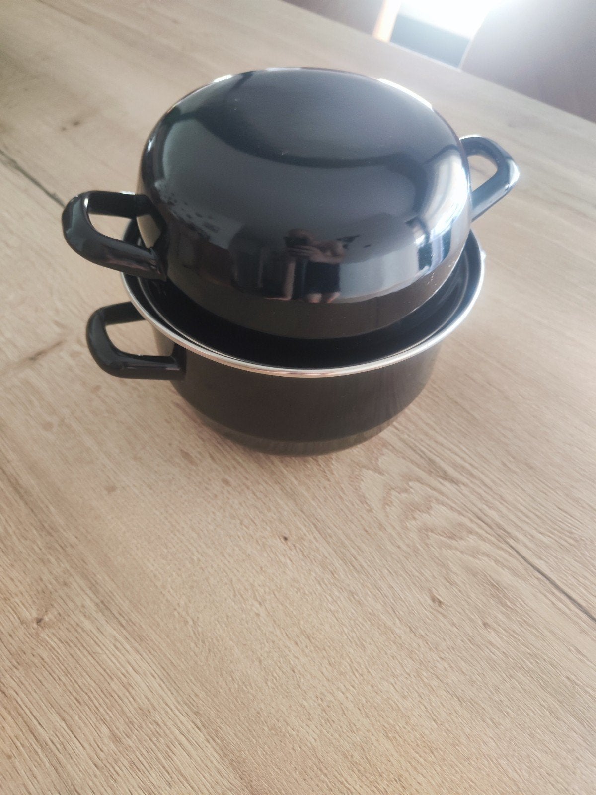 Mosselpot, Ophalen