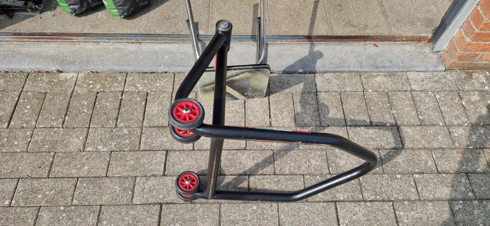 paddock stand, Ophalen