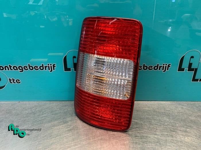 Achterlicht links van een Volkswagen Caddy (Caddy 04-), Gebruikt, -, Volkswagen, -