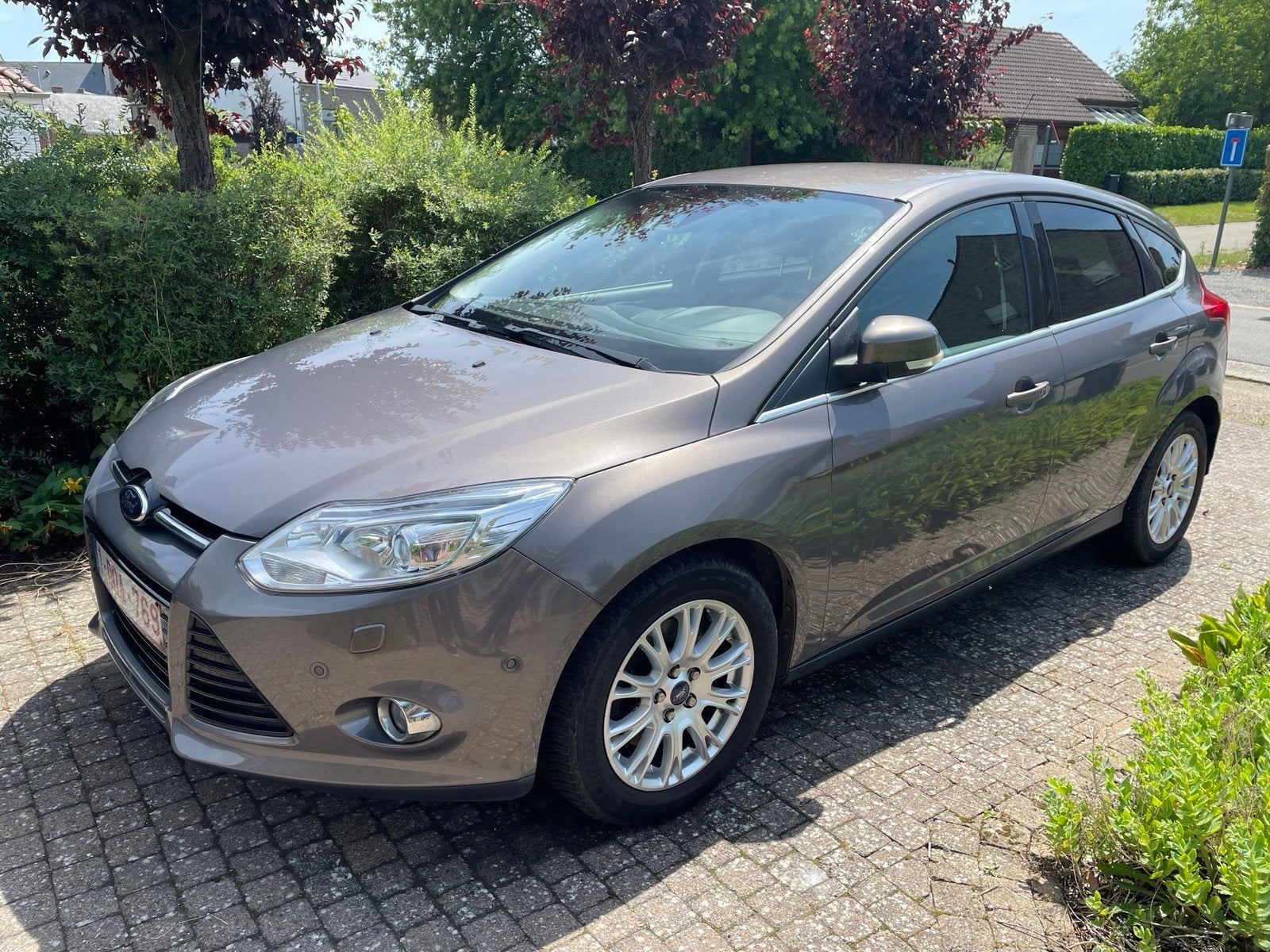 Ford Focus Ecoboost 2012 103450km, Auto's, Ford, Stof, Zwart, 4 cilinders, Bruin