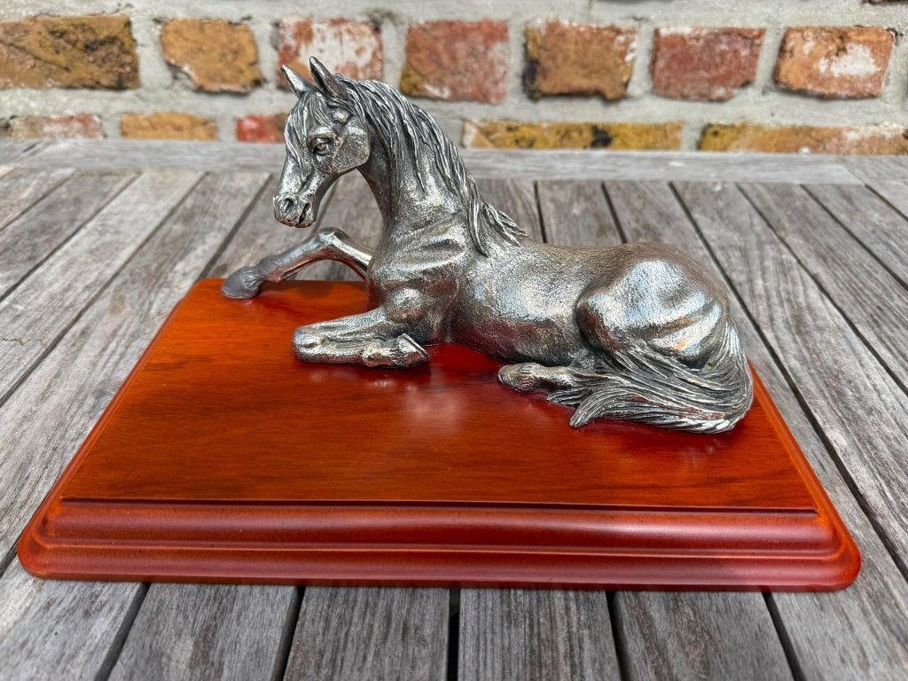 Beeld paard zilver, Ophalen