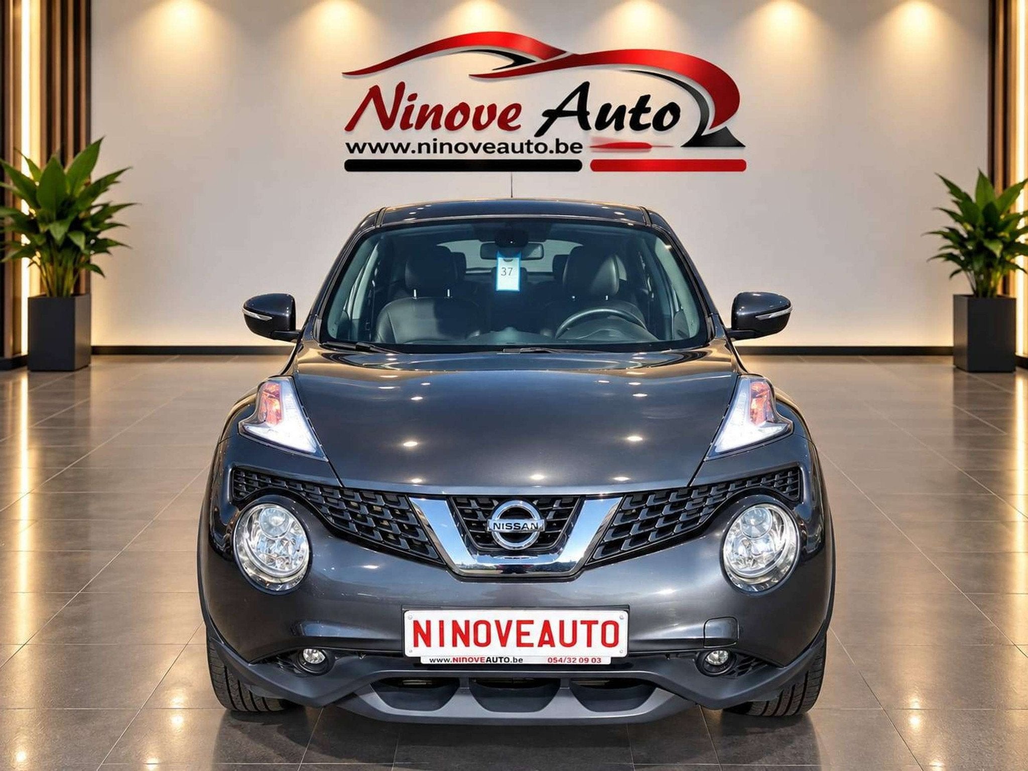 Nissan Juke 1.6i 2WD N-Connecta AUTOMAAT NAVI CAMERA TREKHAA, Auto's, Gebruikt, Euro 6, 4 cilinders, Leder