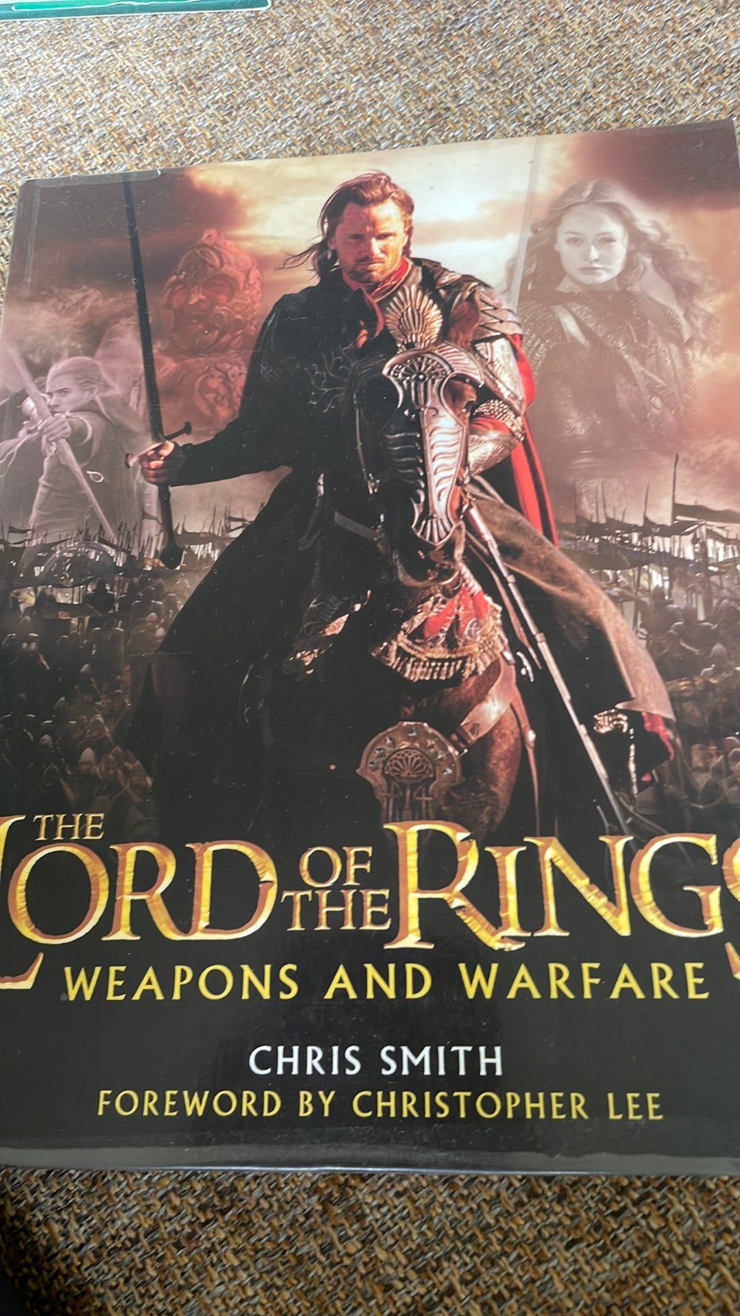 Boek The Lord of the Rings weapons and warfare, Ophalen of Verzenden, Nieuw, Boek of Poster