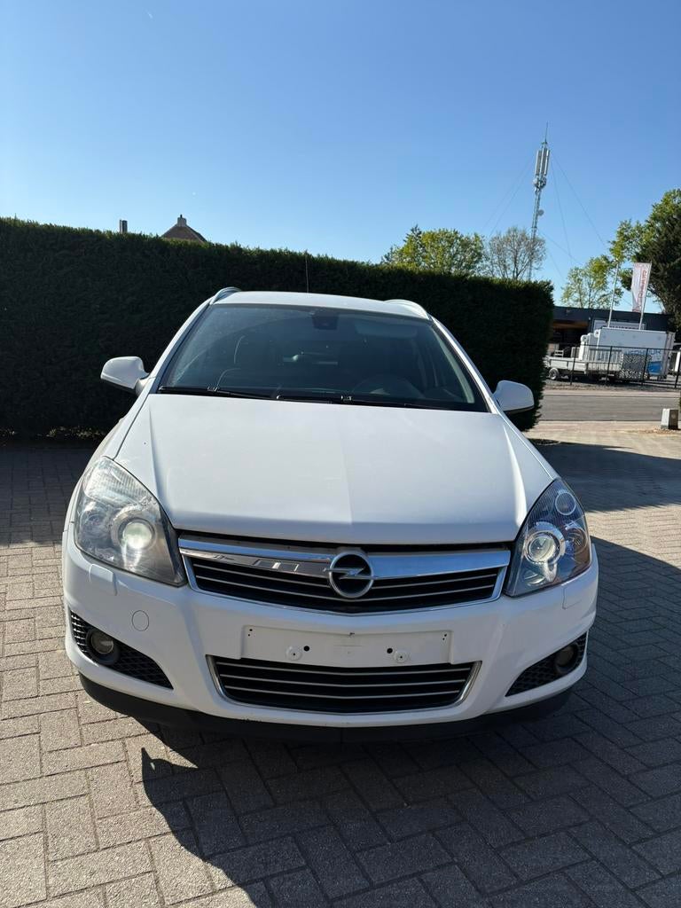 Opel Astra Break 1.4 clime essence navi — 2009 — 184 000 km, Autos, Cuir, Achat, Entreprise, Boîte manuelle
