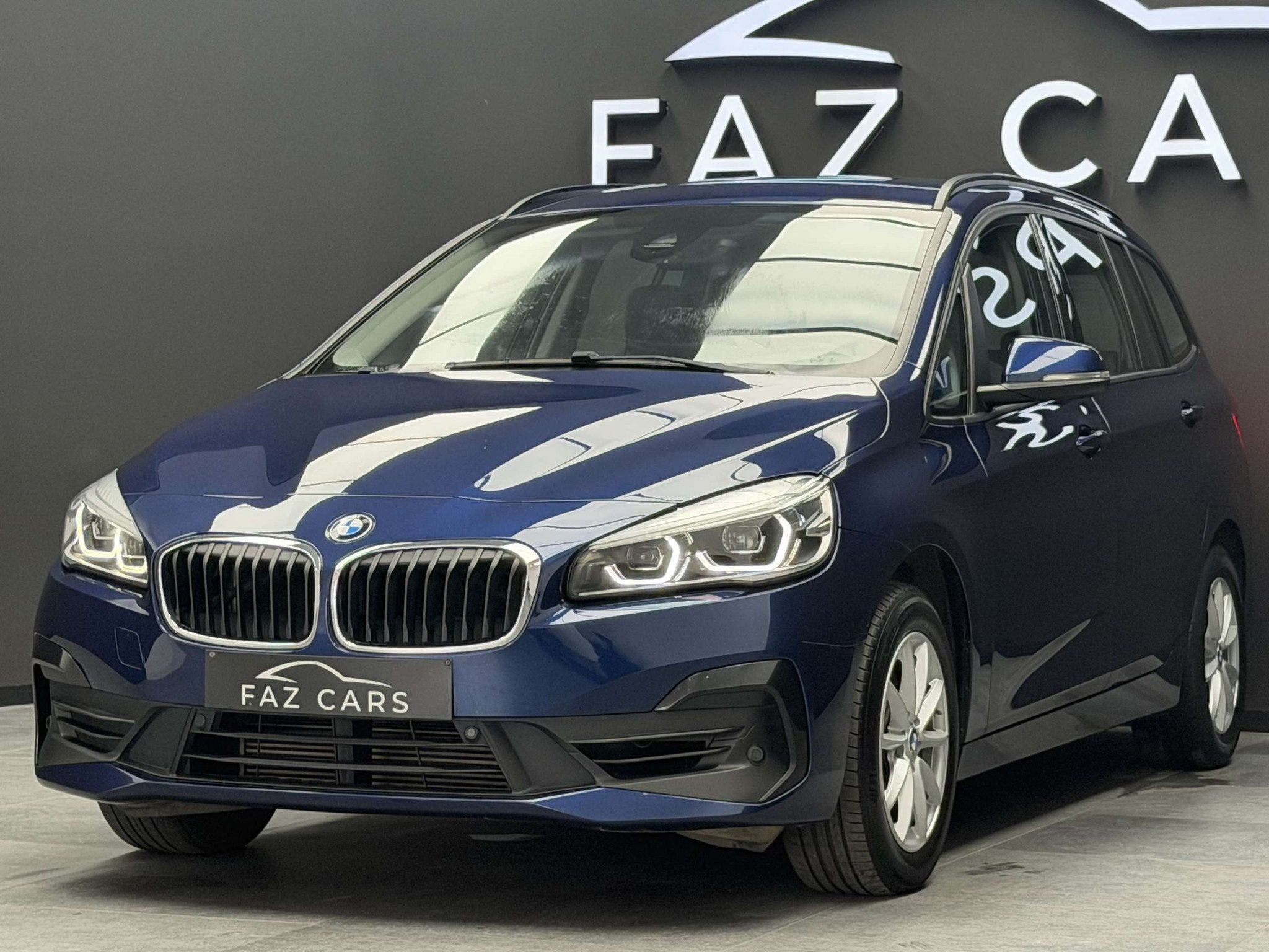 BMW 2 Serie 218 iA Gran Tourer * 1ER PROP + CUIR + GPS + GAR, Gebruikt, Blauw, Leder, Bedrijf