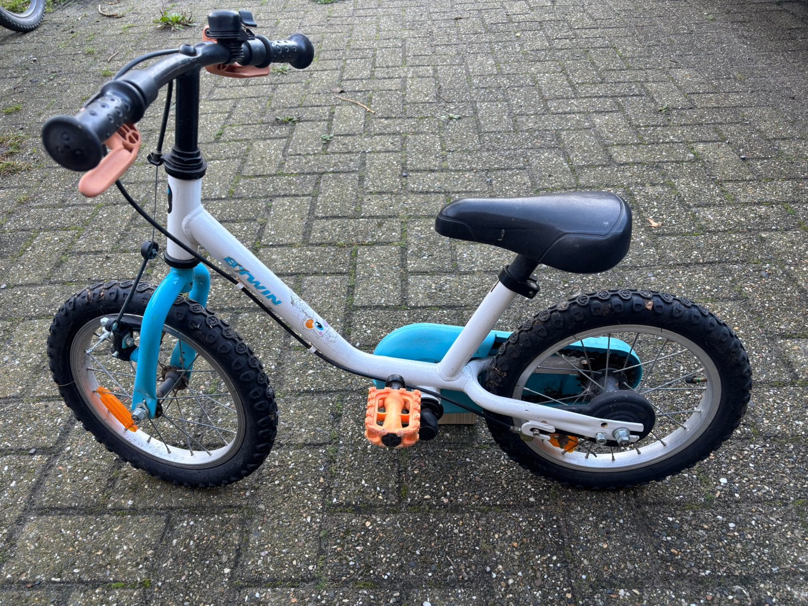Btwin arctic 100 kinderfiets, Ophalen, Zijwieltjes, Gebruikt, Velgrem