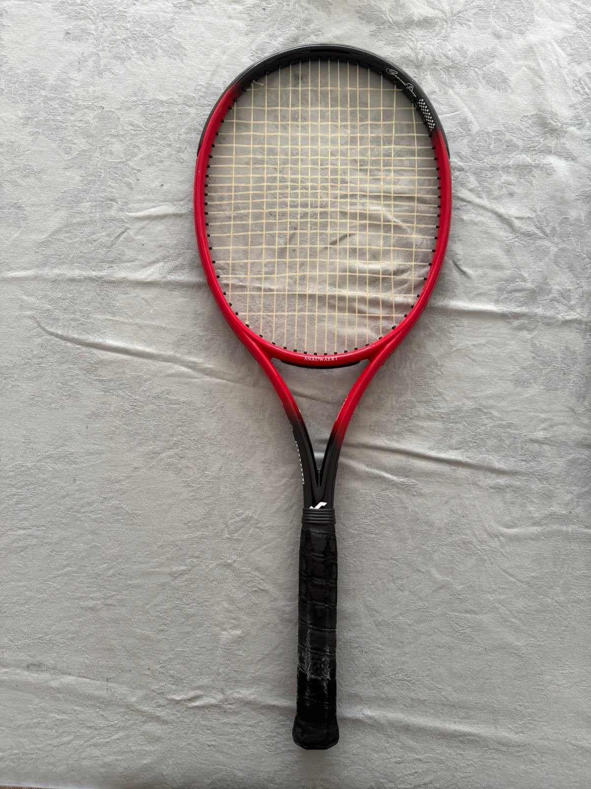 Snauwaert tennisracket, Enlèvement