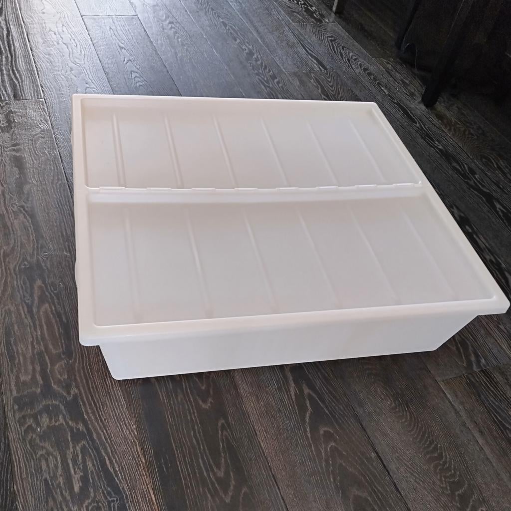 Opbergbak voor onder bed, Ophalen
