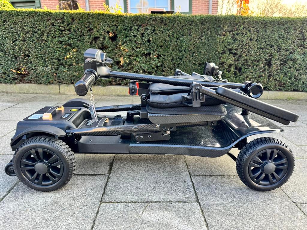Opvouwbare Carbon Ultralichte 14kg Scootmobiel Nieuw scooter, Diversen, Rolstoelen, Ophalen of Verzenden