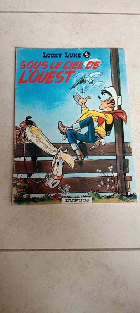 BD Bande dessinée Lucky Luke n4 Sous le soleil 1977, Ophalen of Verzenden, Gelezen