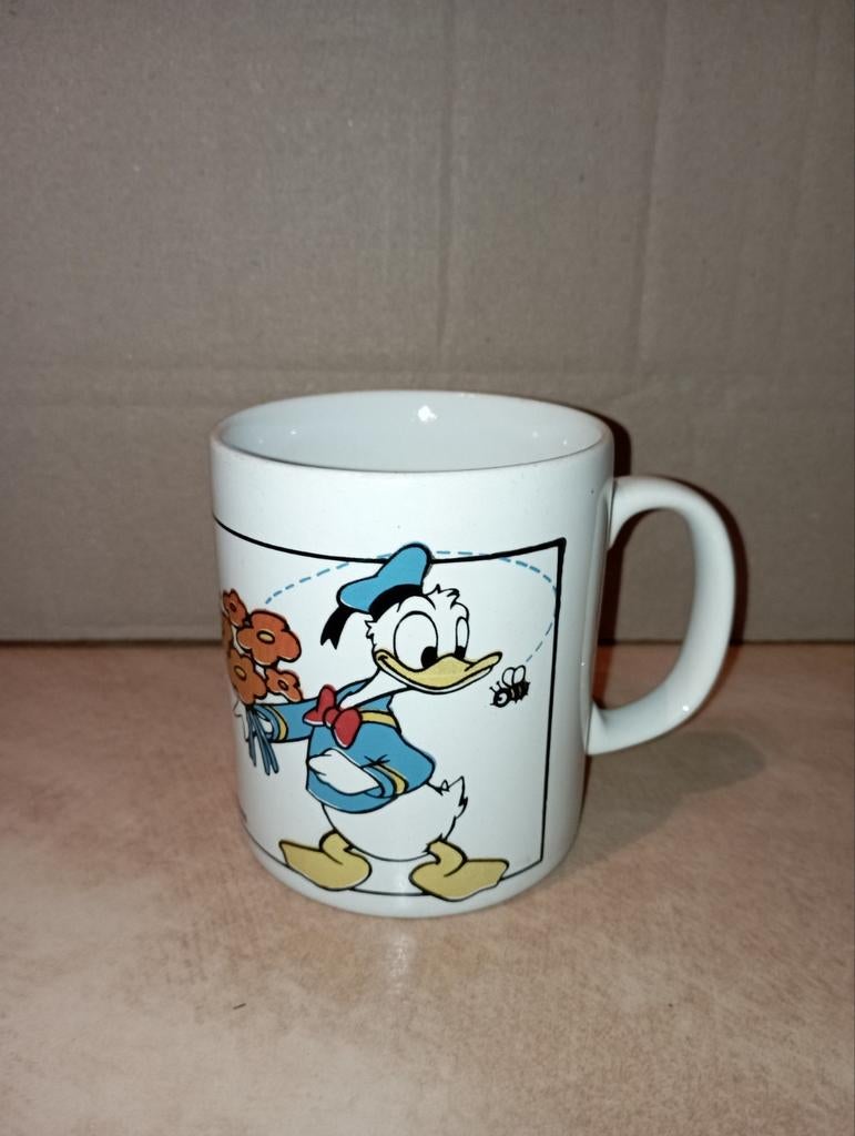 Koffietas Disney Donald en Daisy Duck, Huis en Inrichting, Ophalen of Verzenden, Zo goed als nieuw, Kop(pen) en/of Schotel(s)