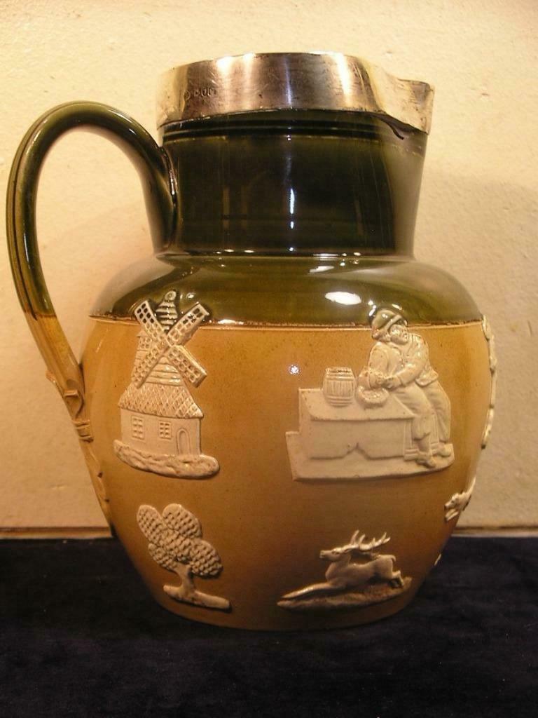 PICHET A EAU ET CERAMIQUE DOULTON/CERCLAGE ARGENT STERLING, Antiquités & Art, Enlèvement ou Envoi