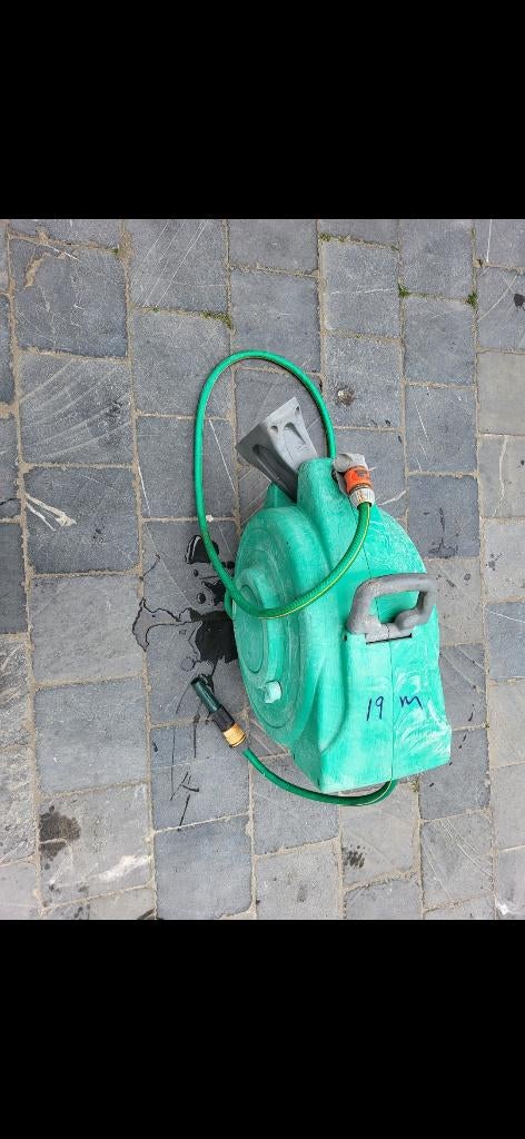 Tuin slang automatik, Ophalen