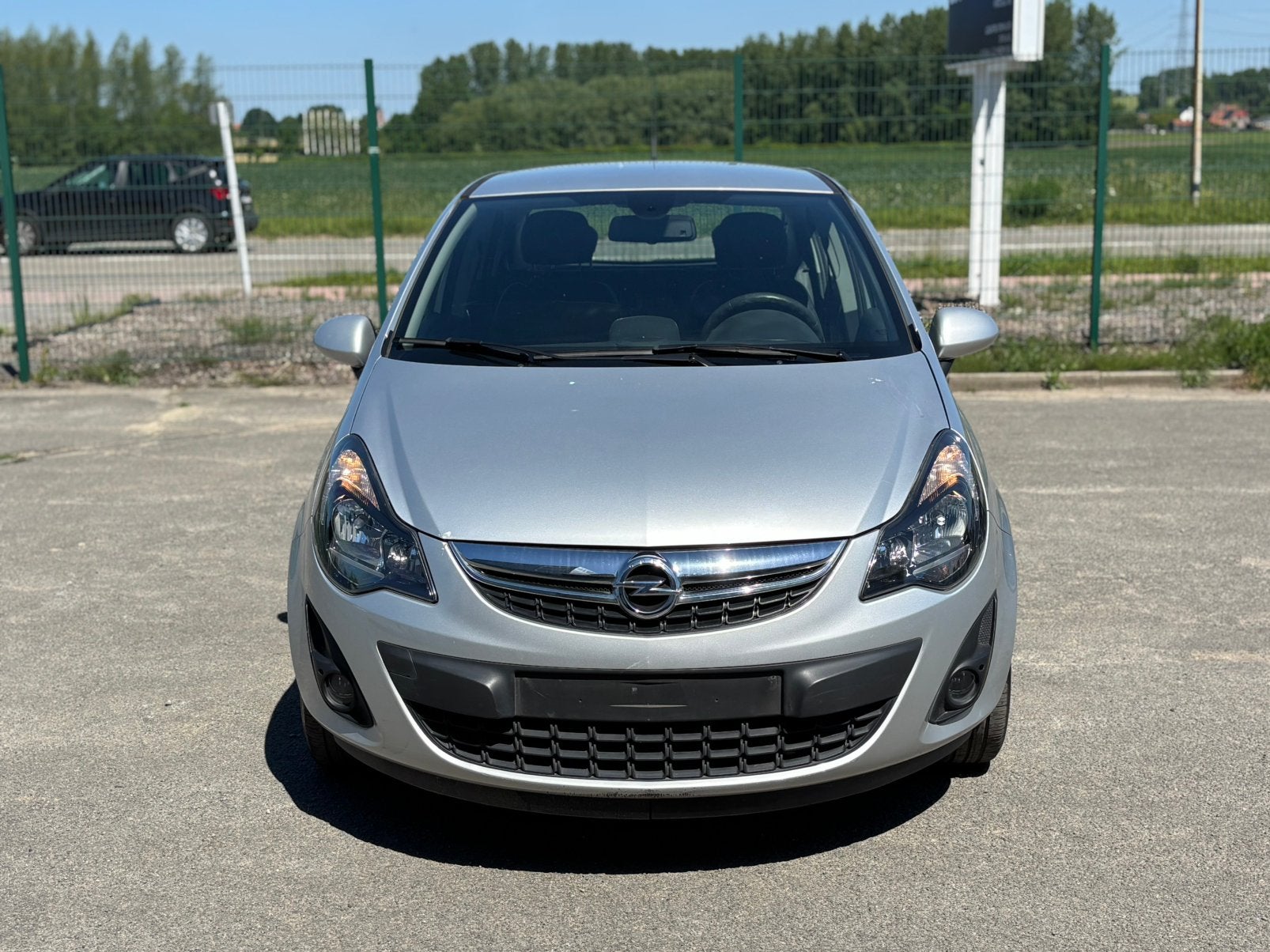 Opel Corsa Cosmo 2014 1.4 essence Airco LEZ Ok 97000km, Euro 5, 50 kW, 996 cc, Bedrijf