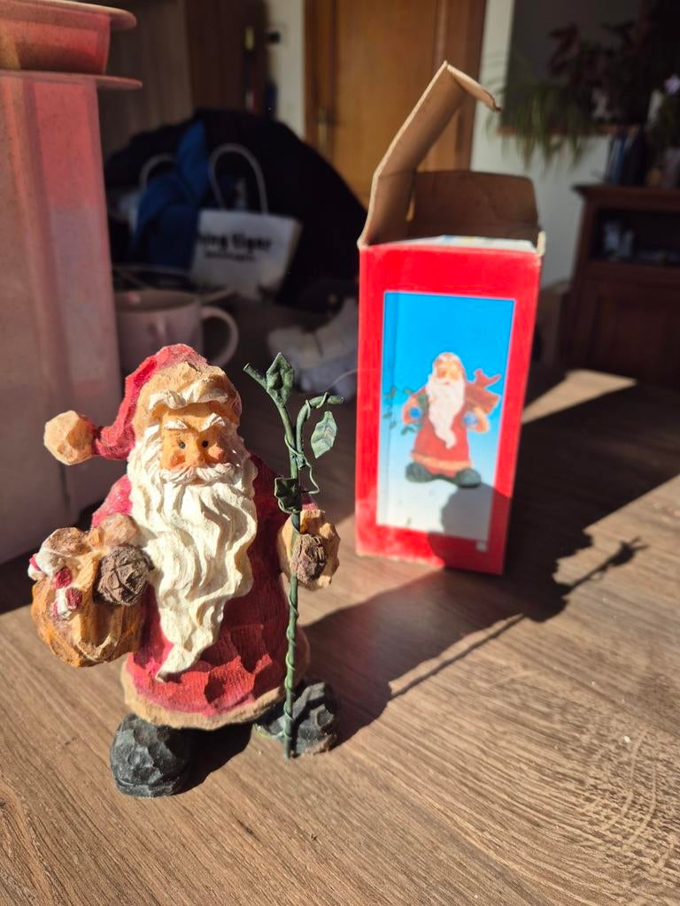 Stenen Kerstman beeld, Ophalen