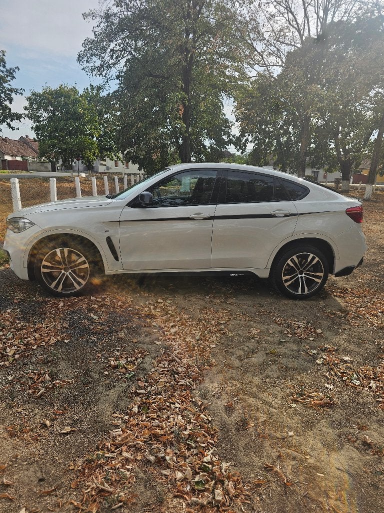 BMW X6 M50D, Autos, Cuir, Achat, 2900 kg, Entretenue par le concessionnaire