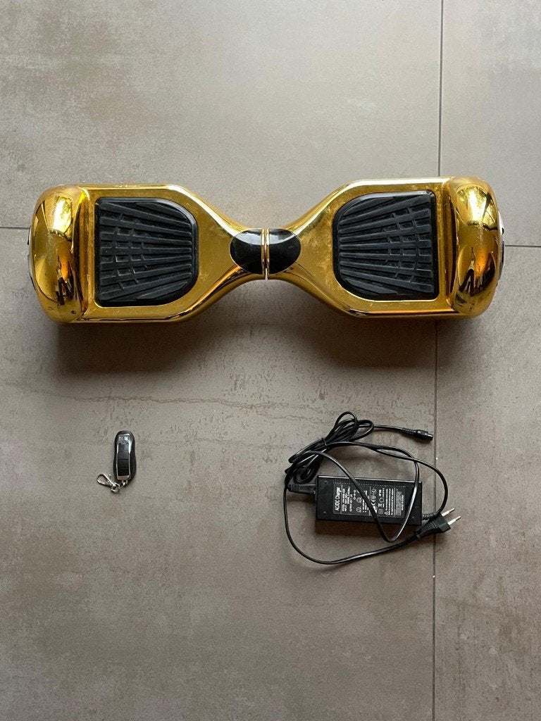 Gouden hoverboard + oplader + afstandsbediening, Gebruikt