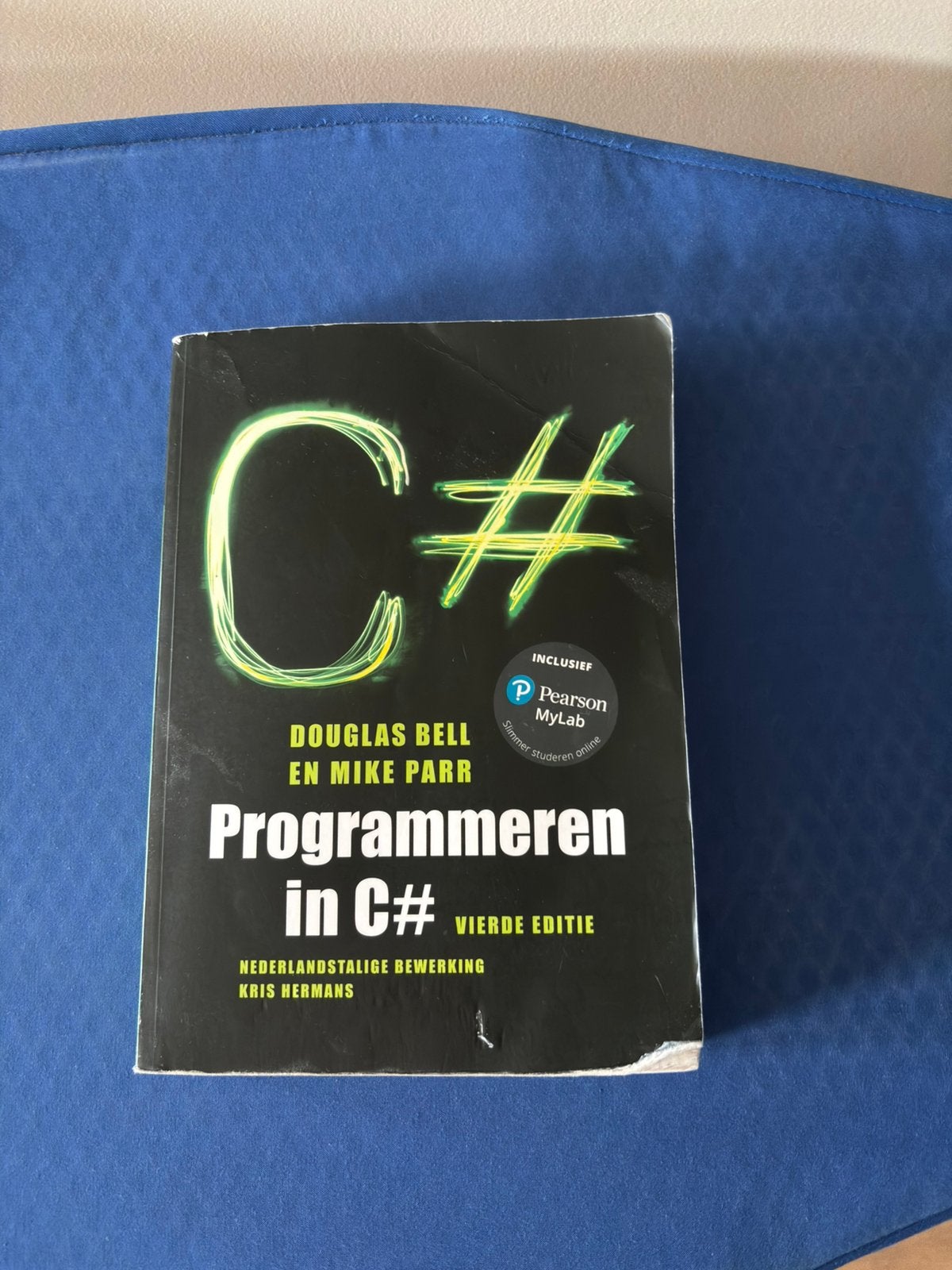 Programmeren in c# boek, Ophalen, Zo goed als nieuw