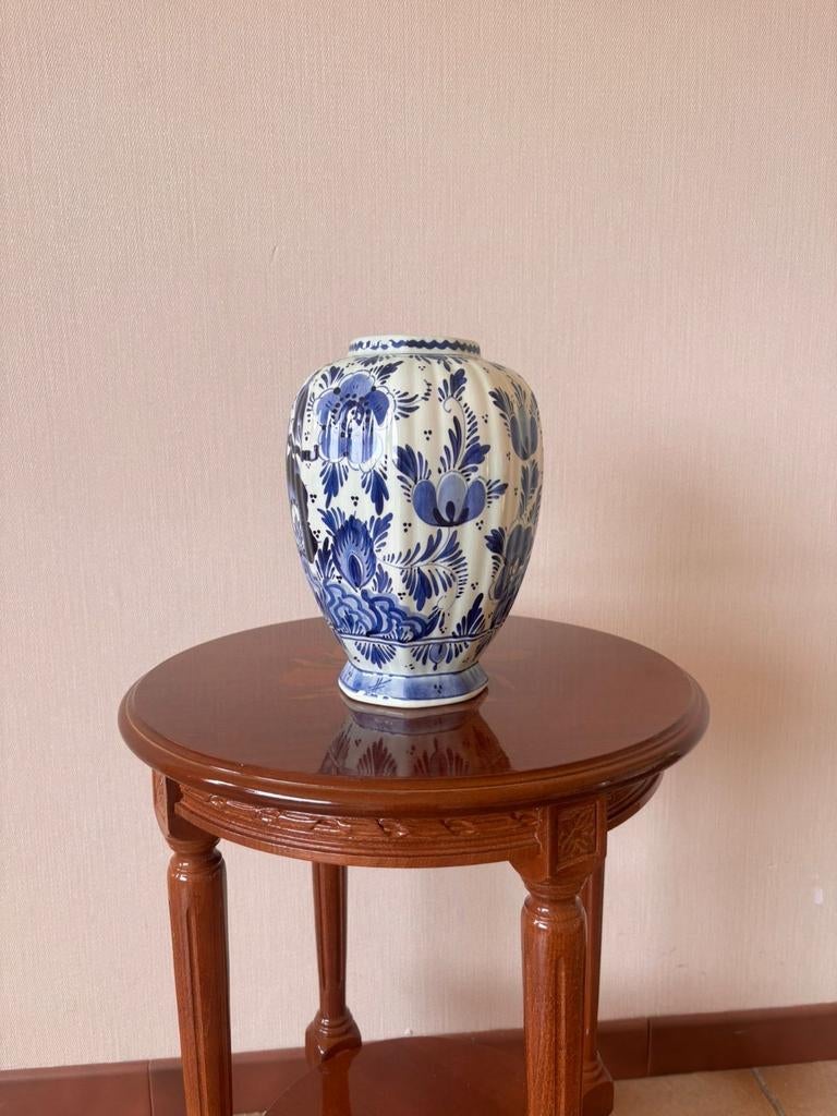 Delfts blauwe vaas, Ophalen