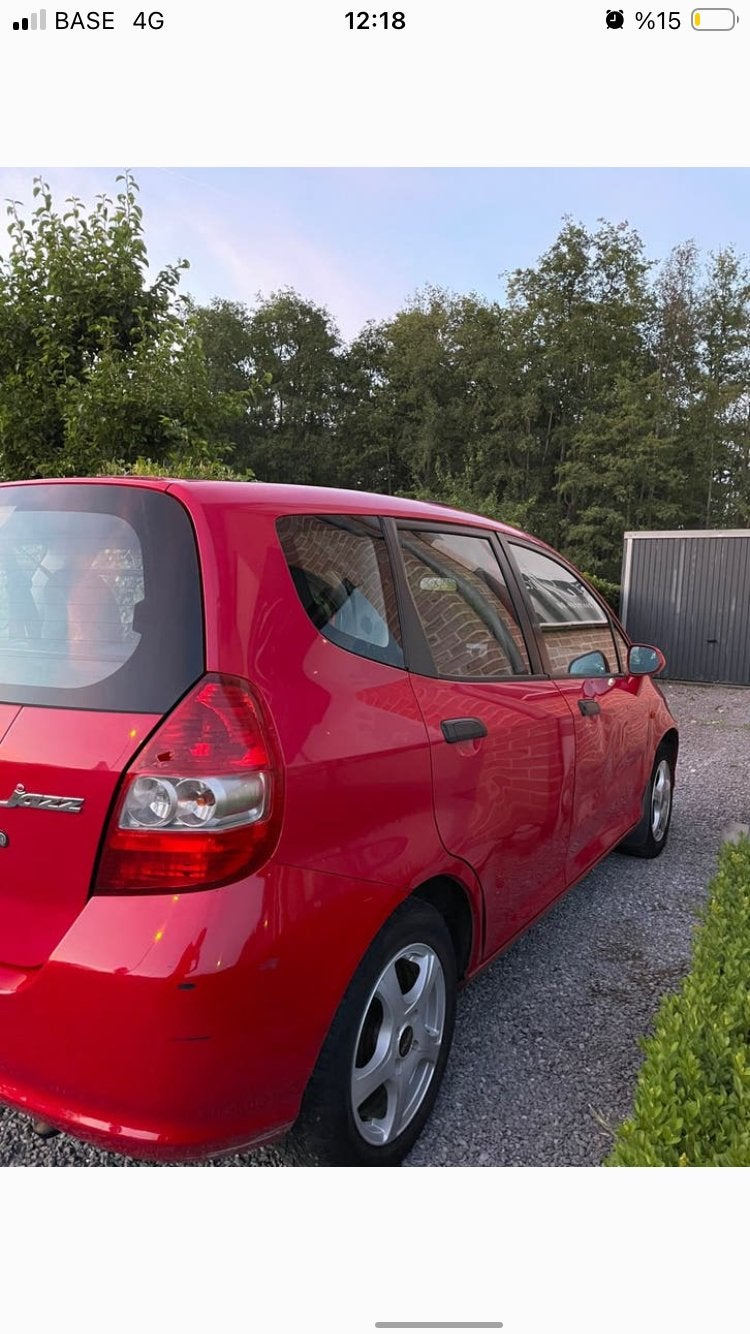 Honda Jazz 1.4 airco met keuring, Autos, Rouge, Achat, Boîte manuelle, Electronic Stability Program (ESP)