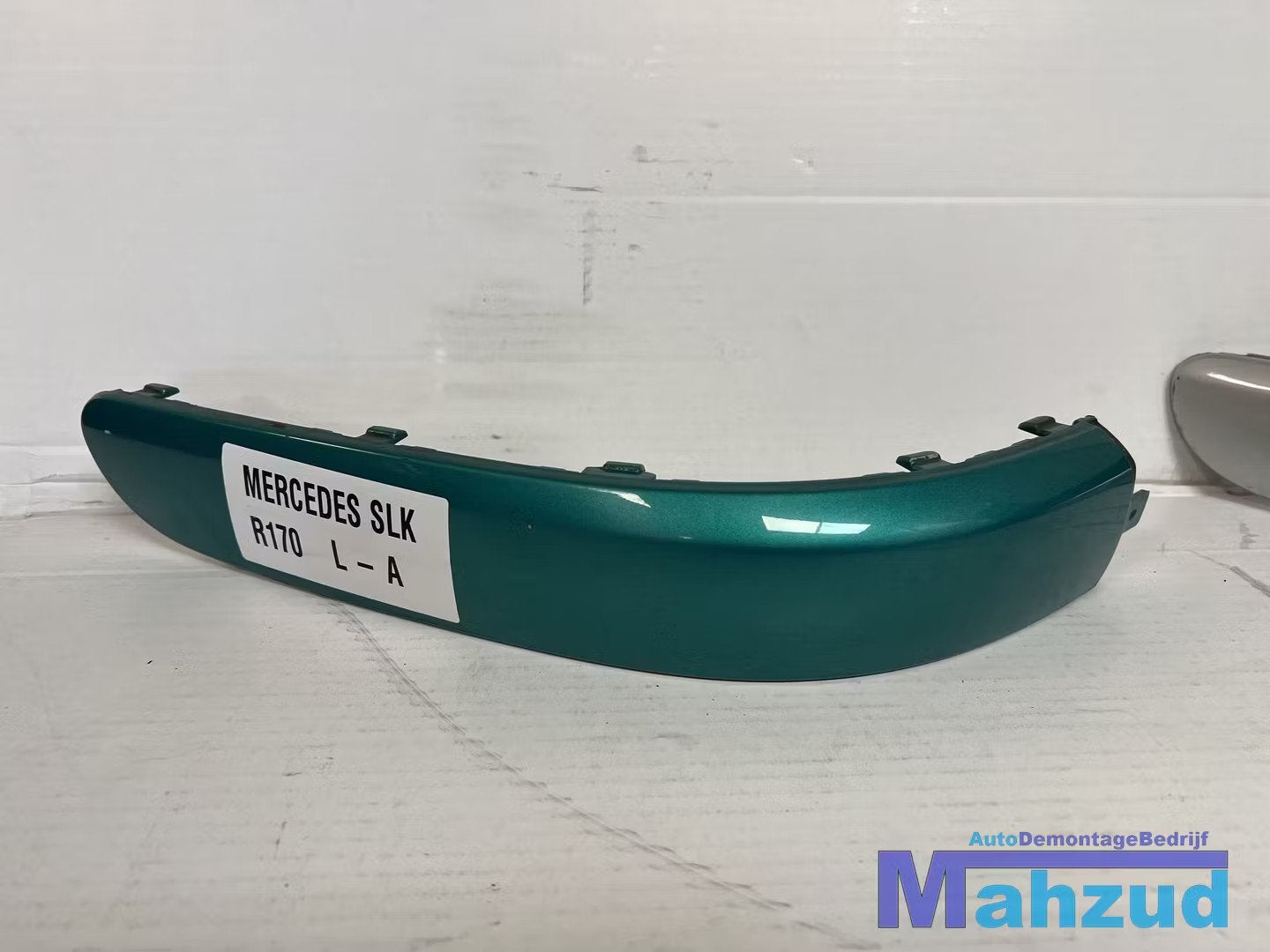 MERCEDES SLK R170 groen Links achter bumper strip A170885052, Gebruikt, Mercedes-Benz AG, Mercedes-Benz, Mercedesstrasse 120
70372  Stuttgart, DE