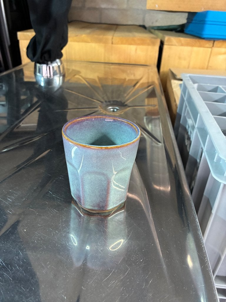 Koffietassen in bakken, Ophalen