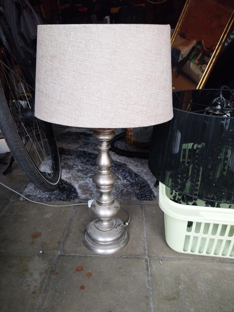 Mooi tinnen lamp, Ophalen