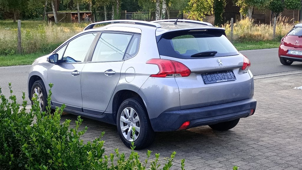 Peugeot 2008 benzine in prima staat., Voorwielaandrijving, Euro 5, Stof, Zwart