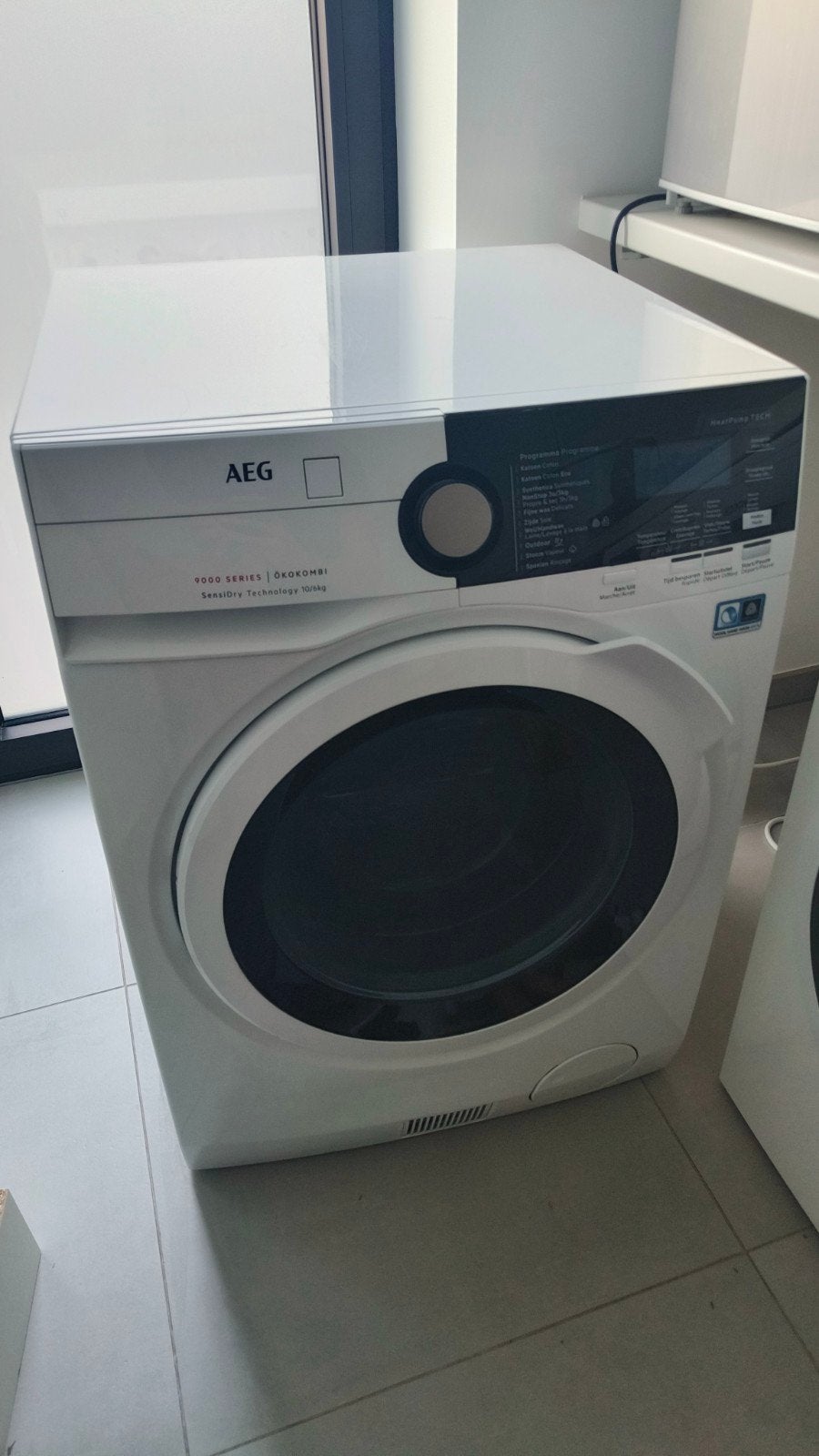 AEG 9000 Serie ÖKOKOMBI was-droogcombinatie, 10 kg of meer, Ophalen, Zo goed als nieuw, Minder dan 85 cm