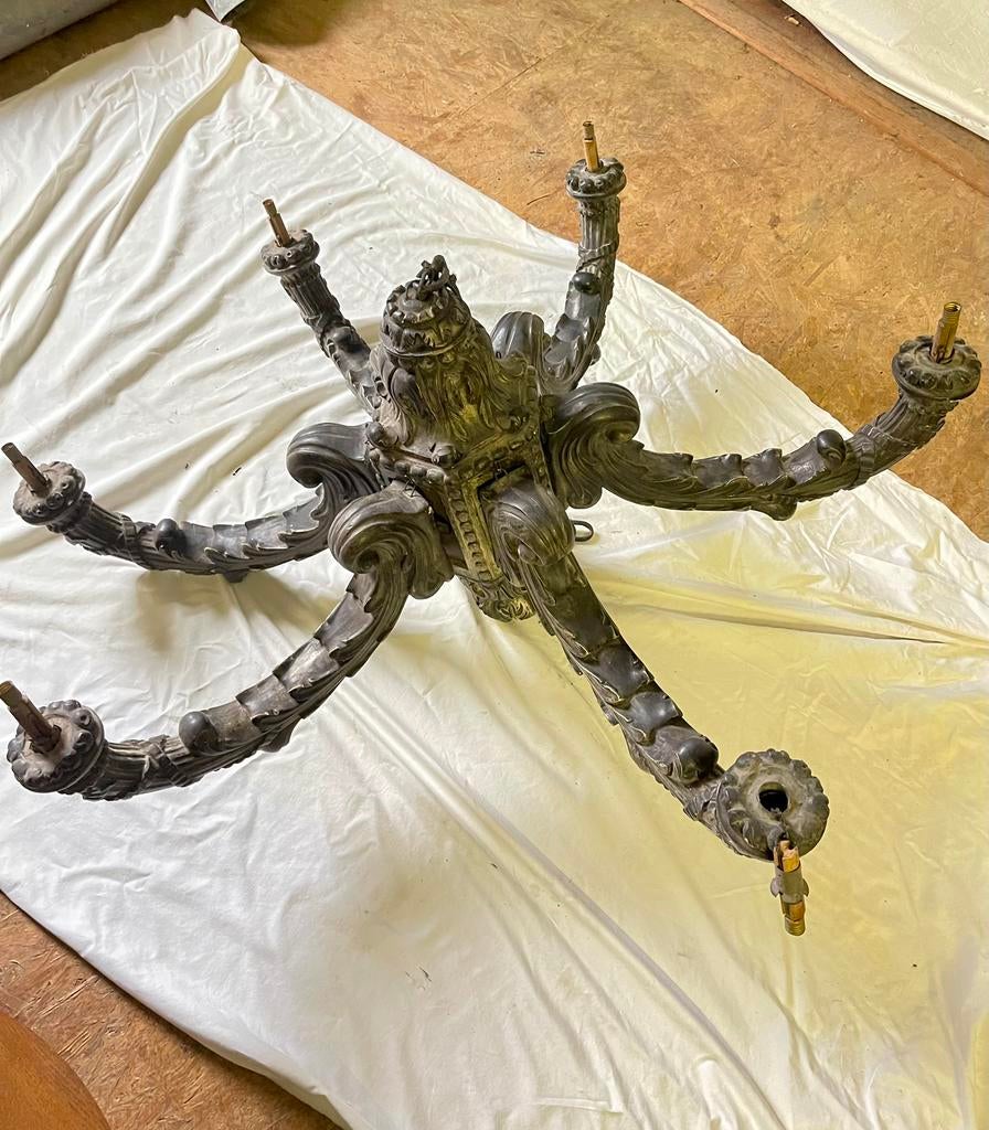 Antieke kroonluchter, Ophalen