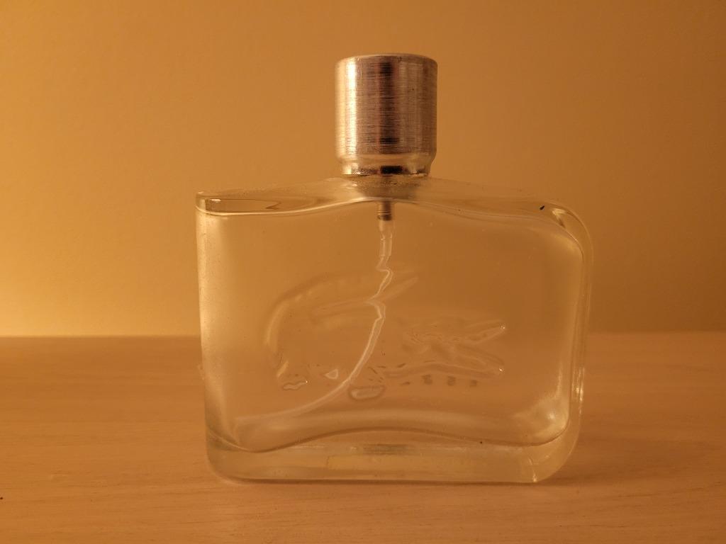 leeg parfumflesje lacoste 100 ml essentieel, Verzamelen, Ophalen of Verzenden, Gebruikt, Parfumfles