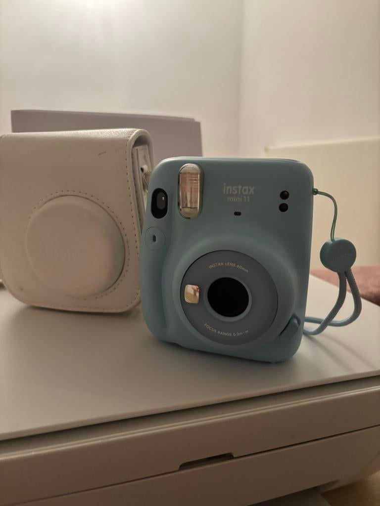 Fujifilm Instax Mini 11 sky bleu, Ophalen