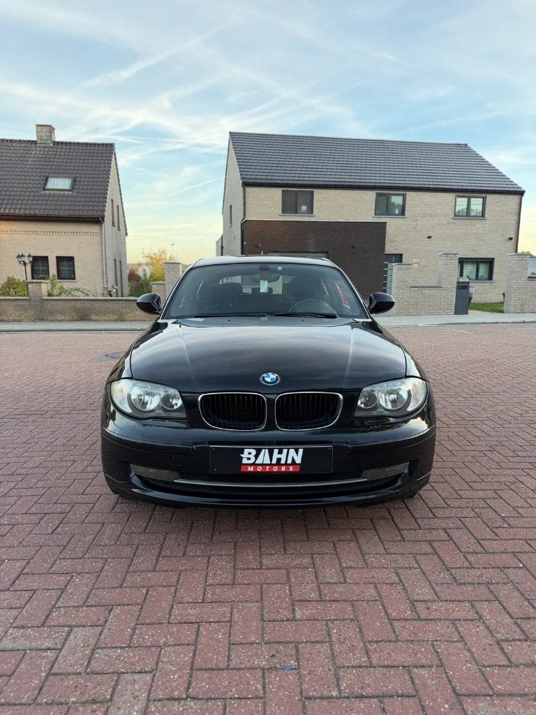 BMW 1-serie (143.000 KM), 1 Reeks, Zwart, Bedrijf, https://public.car-pass.be/vhr/2c18ec5c-e2fb-452a-9a1d-3eac93c1532d