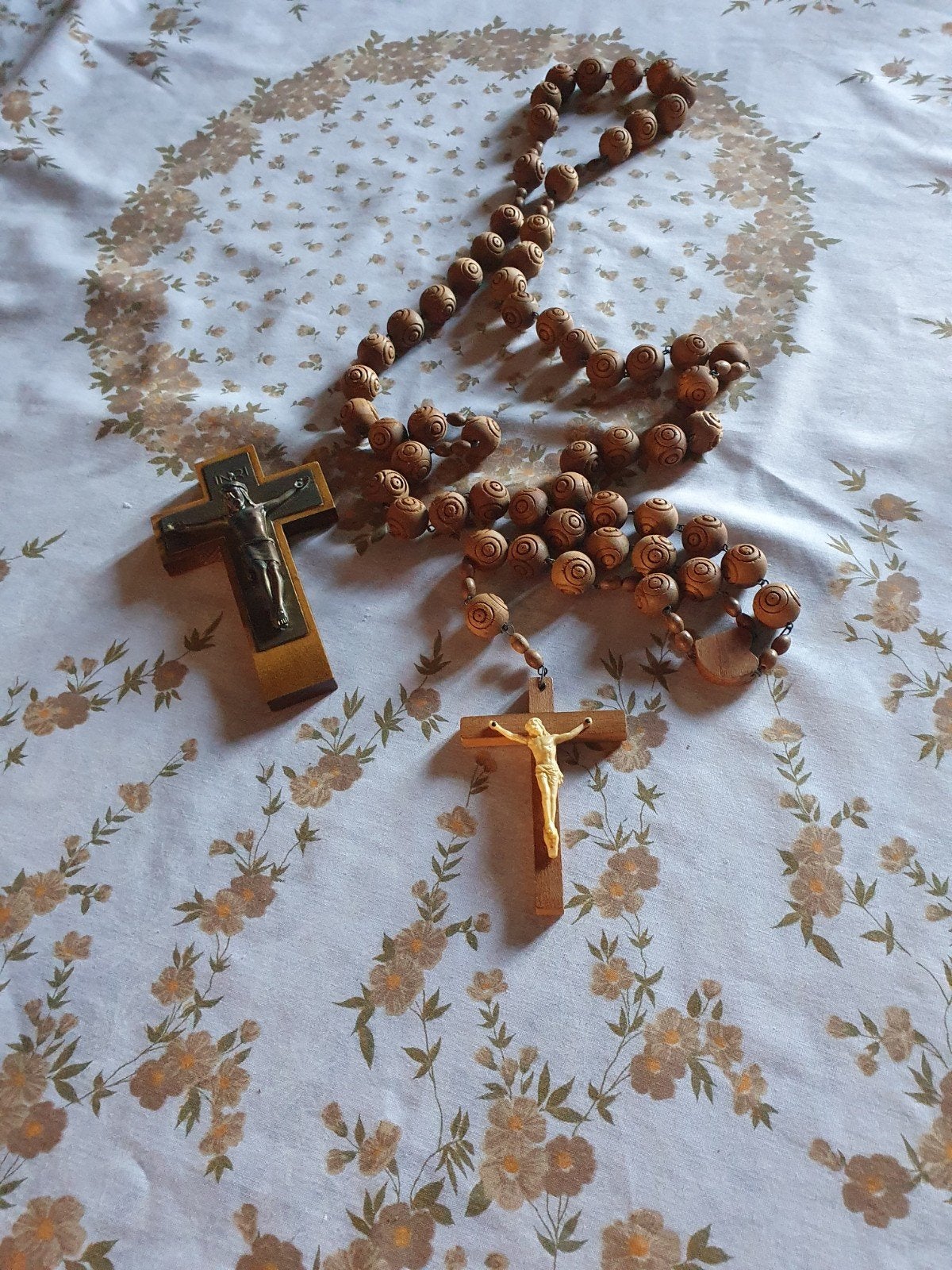 paternosters  twee kruisen, Ophalen