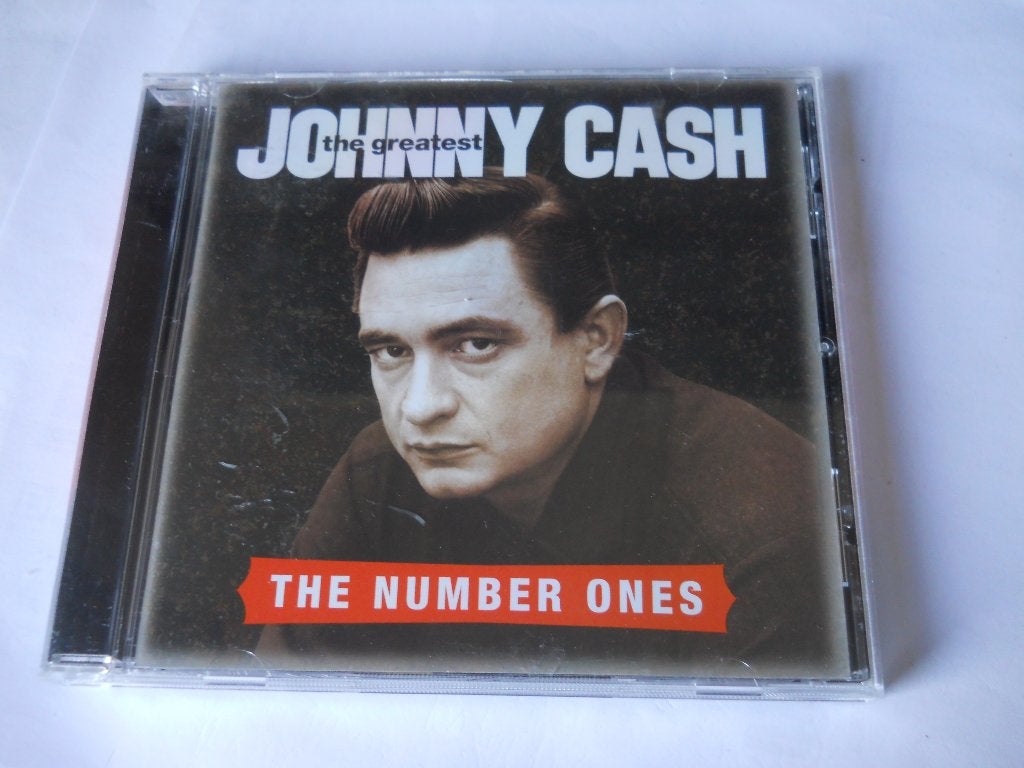 CD - JOHNNY CASH - LES NUMÉROS UN, Enlèvement ou Envoi, Pop, Premier pressage, Comme neuf