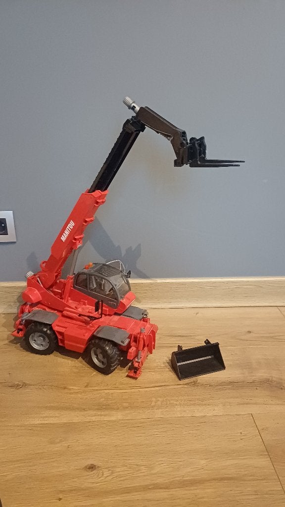 Manitou télescopique rotatif, Enlèvement