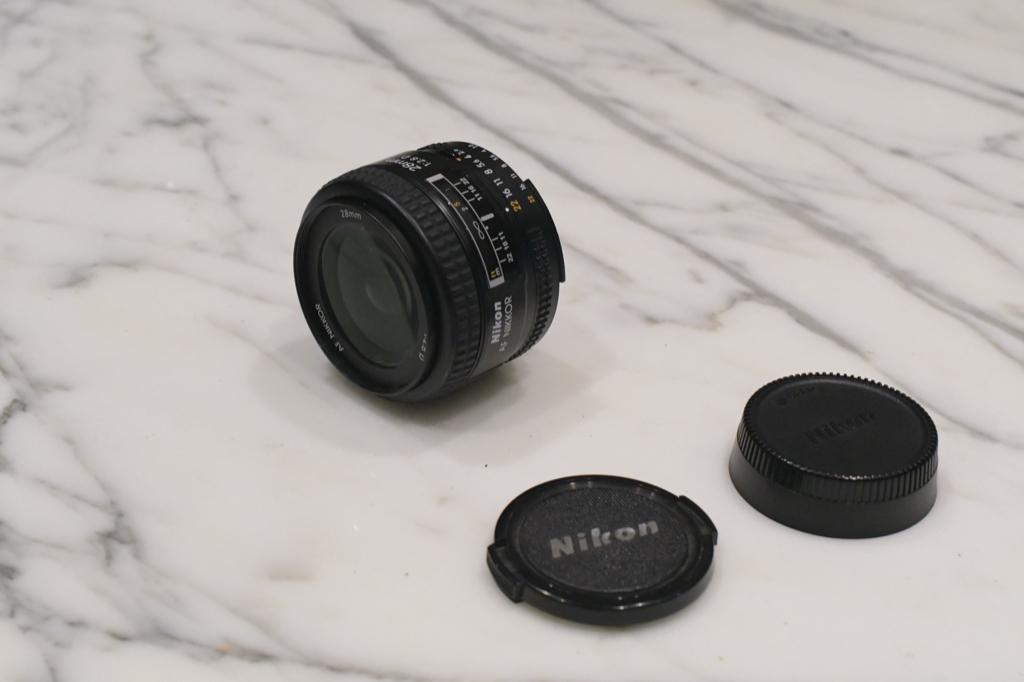 Nikon 28 mm f/2.8AF-D N 460086, Enlèvement ou Envoi, 1980 à nos jours, Lentille ou Lentilles