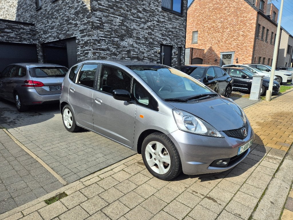 Honda Jazz 1.4i-Vtec 2009 58.000kms 1ste eig. Airco GARANTIE, Voorwielaandrijving, Dealer onderhouden, Stof, Zwart