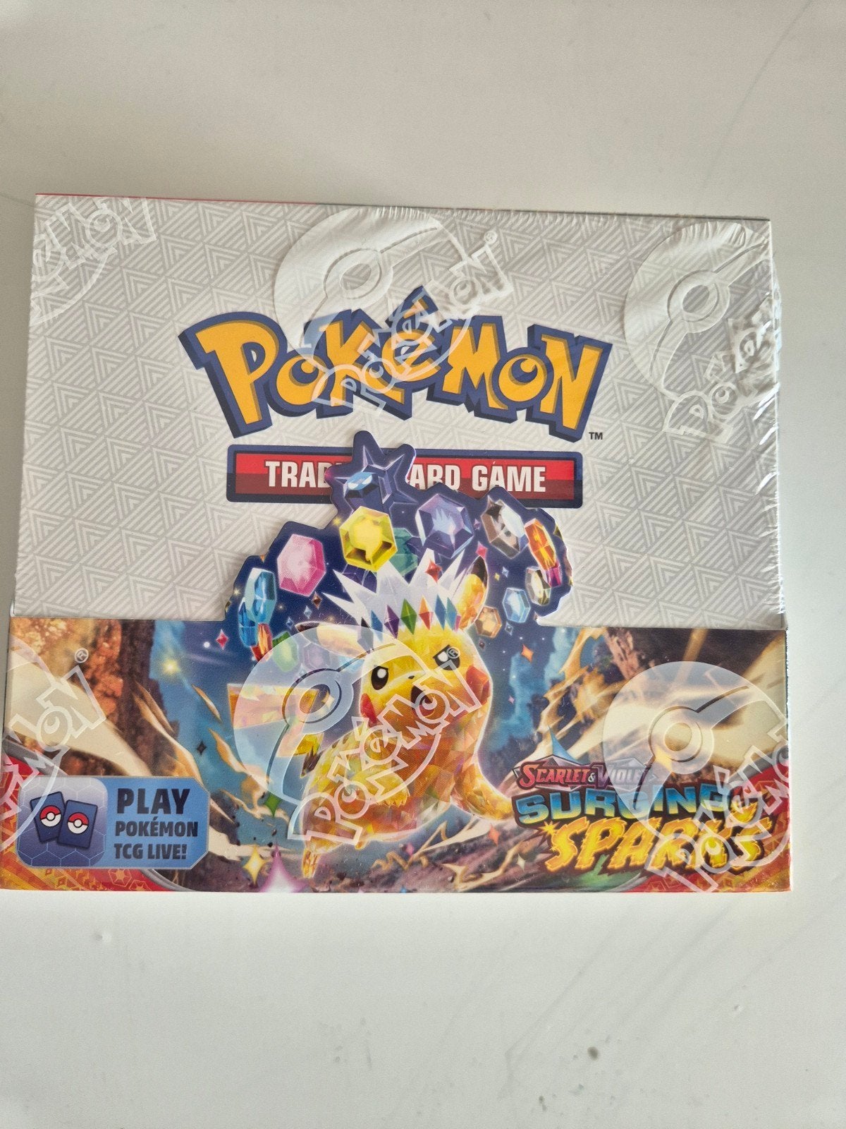 Pokemon Surging Sparks Boosterbox, Hobby en Vrije tijd, Verzamelkaartspellen | Pokémon, Verzenden, Boosterbox