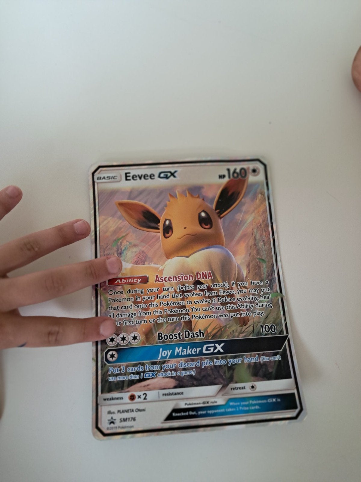 Jumbo eevee GX pokemonkaart, Hobby en Vrije tijd, Ophalen of Verzenden, Zo goed als nieuw, Losse kaart, Foil