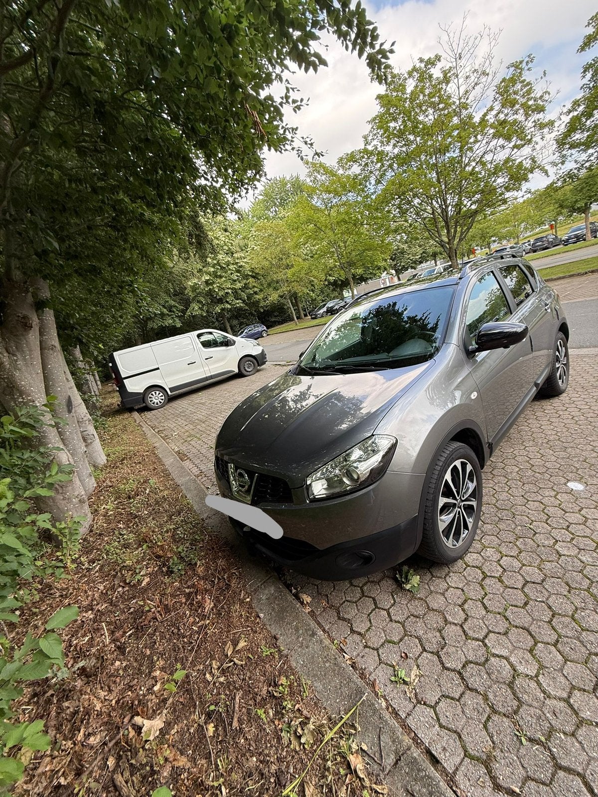 Nissan QASHQAI 1.6 L essence SUV automatique, Auto's, Automaat, Zwart, Leder en Stof, Vierwielaandrijving