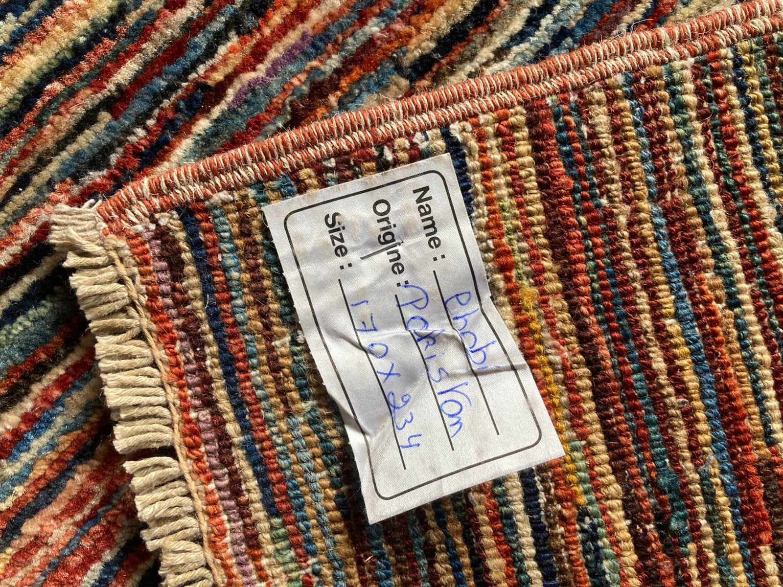 Handgeknoopt tapijt uit Pakistan, Ophalen, Zo goed als nieuw